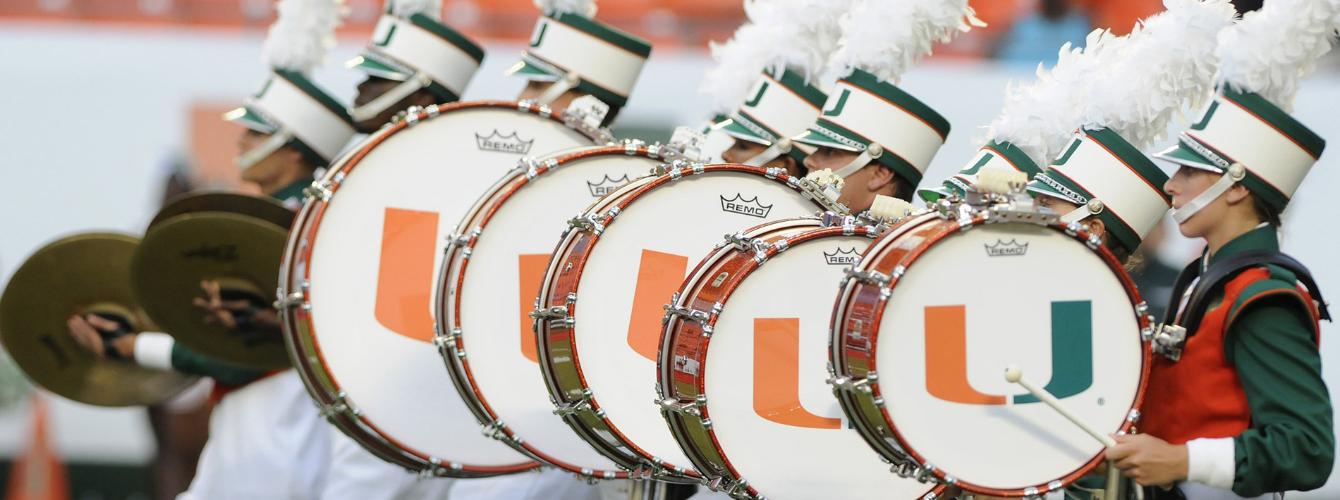 Marching band drum line performing during a game