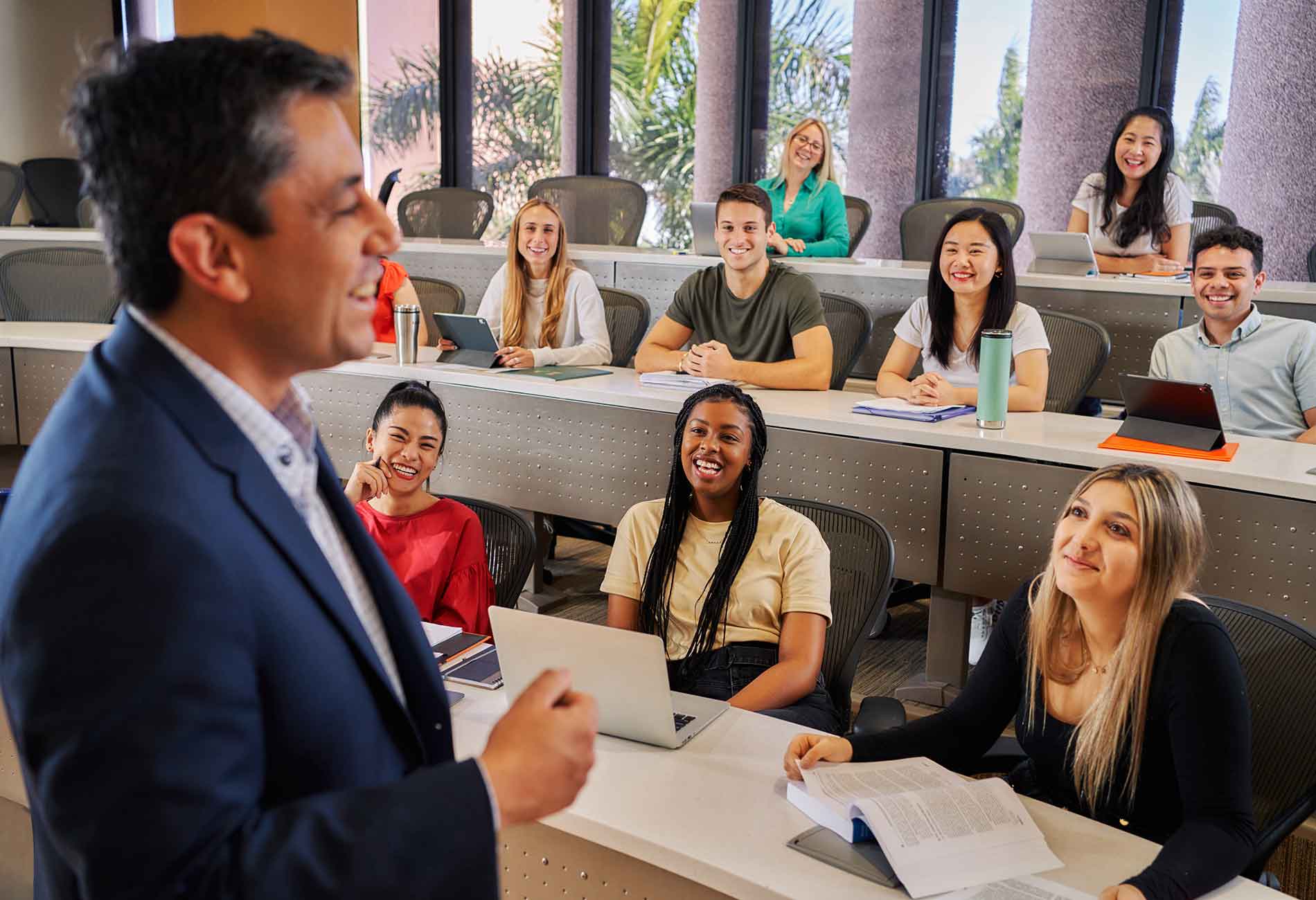 Professor classroom lecture. Finance class. Lorenzo Naranjo teaching class. Students in class.