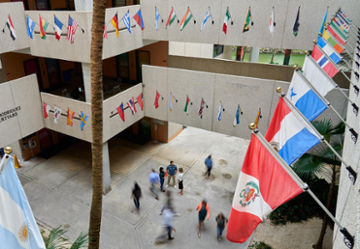 World flags flutter in an open courtyard