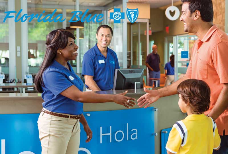 Father and son meeting worker at Florida Blue.