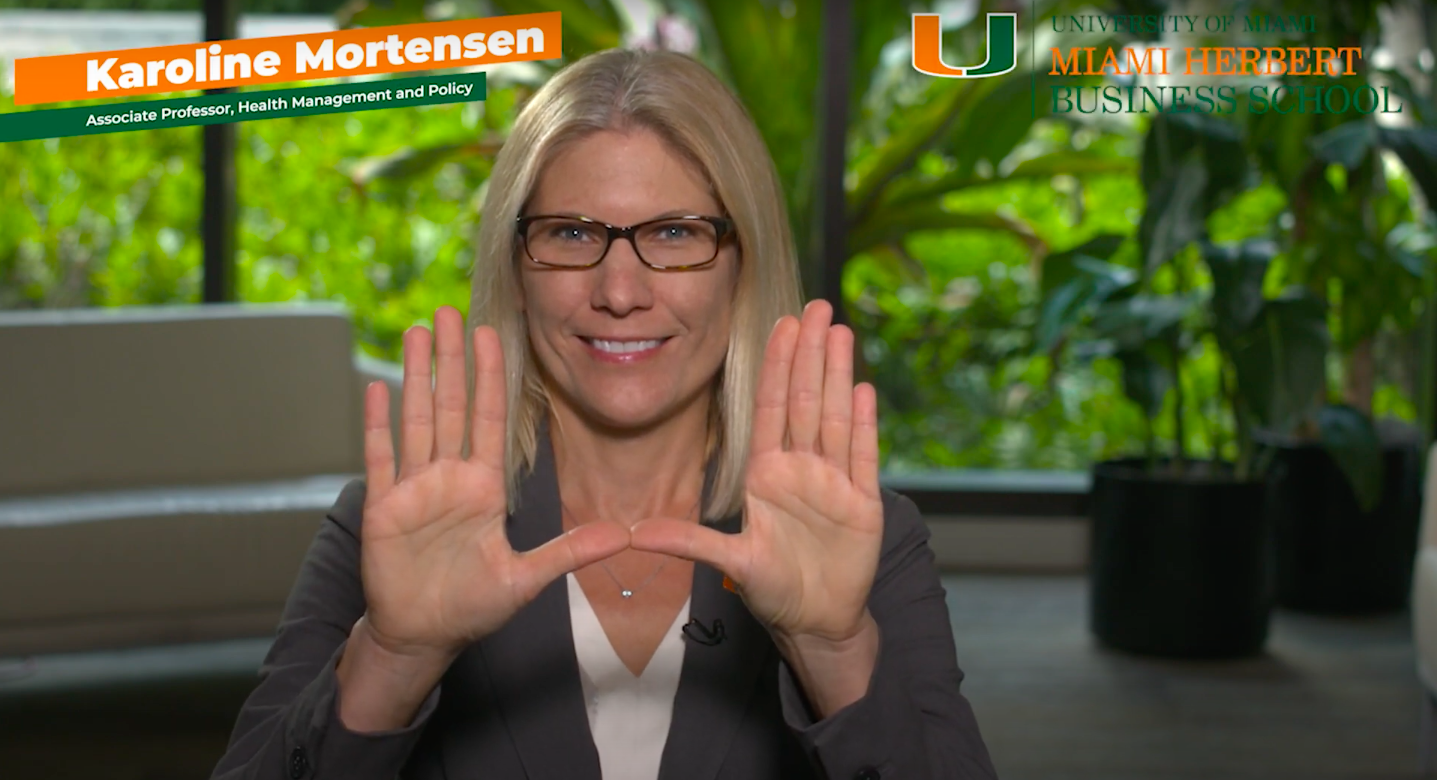 Karoline Mortensen holds her hands up in a"U" shape.