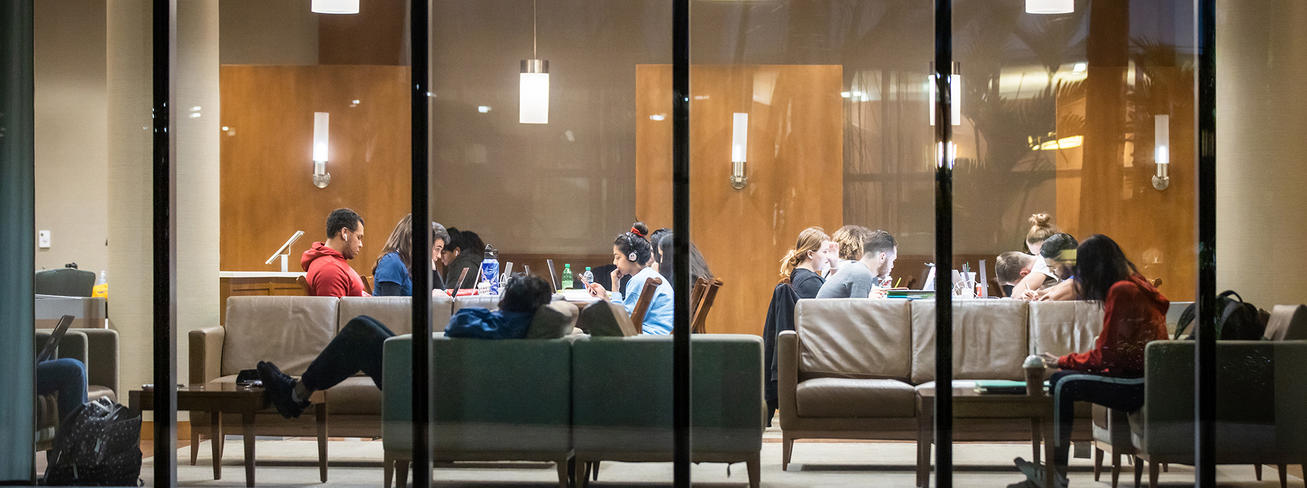 Several students studying in common area.